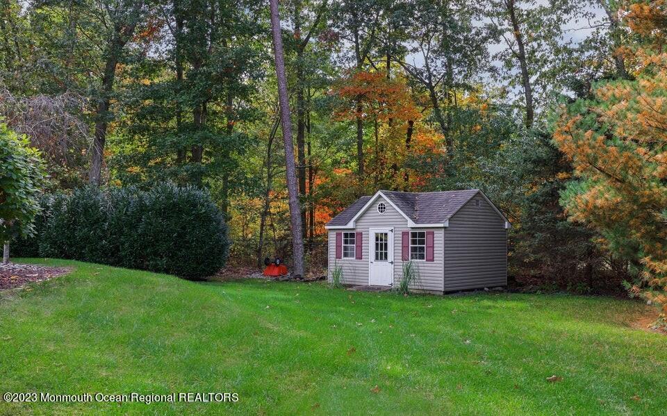 245 Delaware Trail Jackson, NJ 08527 - Photo 36 of 43 a view of a house with a yard