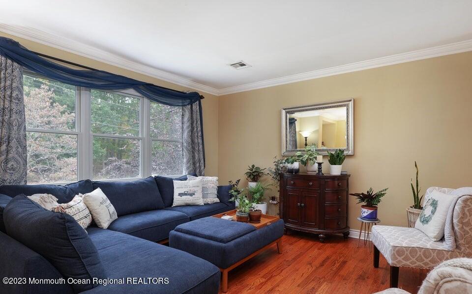 245 Delaware Trail Jackson, NJ 08527 - Photo 6 of 43 a living room with furniture and a large window