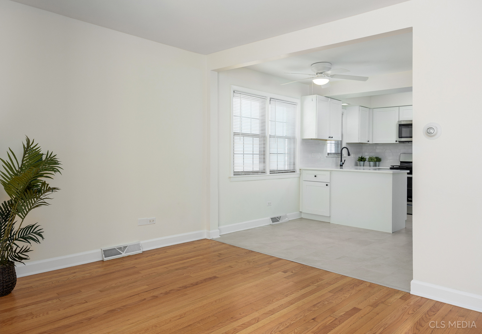 2112 Oakton Street Park Ridge, IL 60068 - Photo 5 of 24 a big room with wooden floor and windows