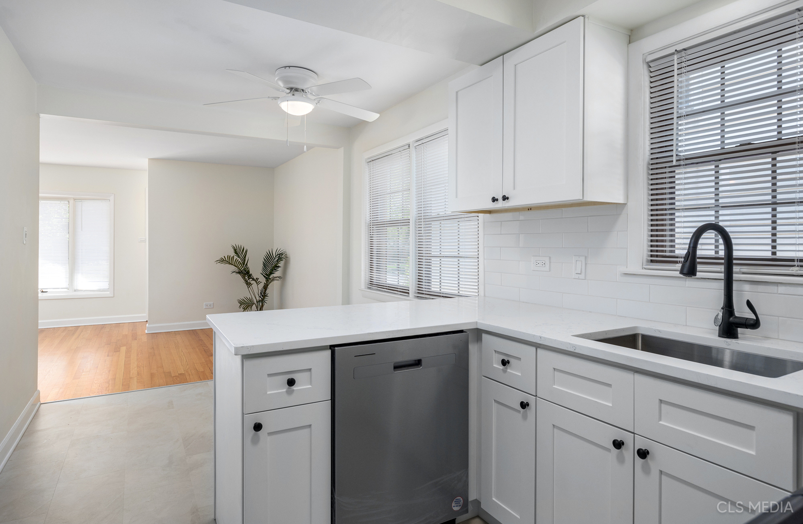 2112 Oakton Street Park Ridge, IL 60068 - Photo 8 of 24 a kitchen with a sink and cabinets