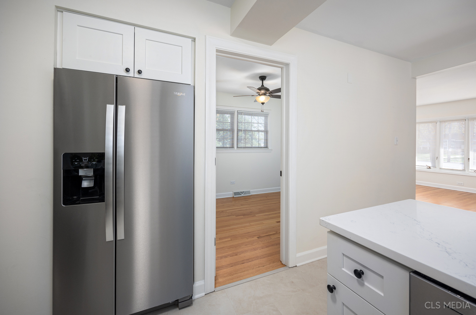 2112 Oakton Street Park Ridge, IL 60068 - Photo 9 of 24 a kitchen with metallic refrigerator freezer and a dishwasher