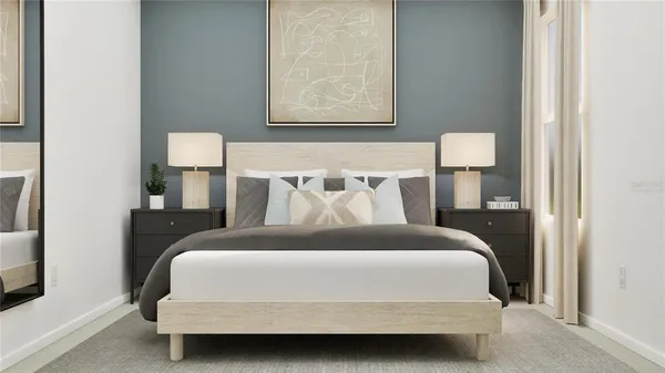 a bedroom with a bed and a night stand