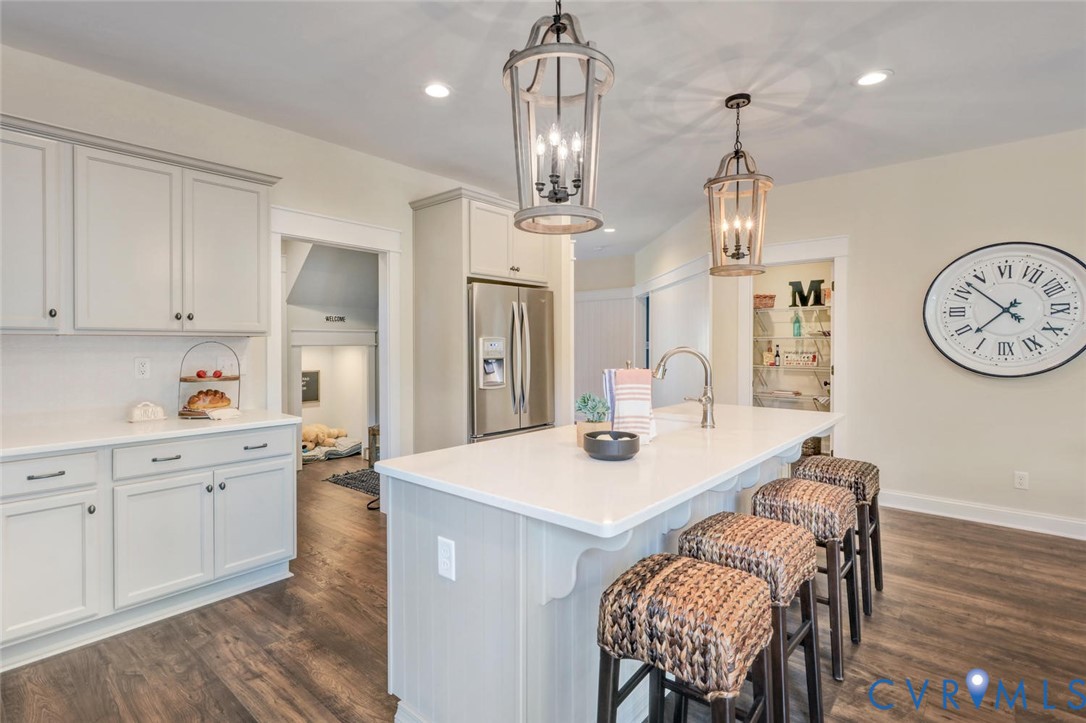 Lot 16 Pin Oak Loop Amelia Court House, VA 23002 - Photo 8 of 14 a view of a dining room with furniture and wooden floor