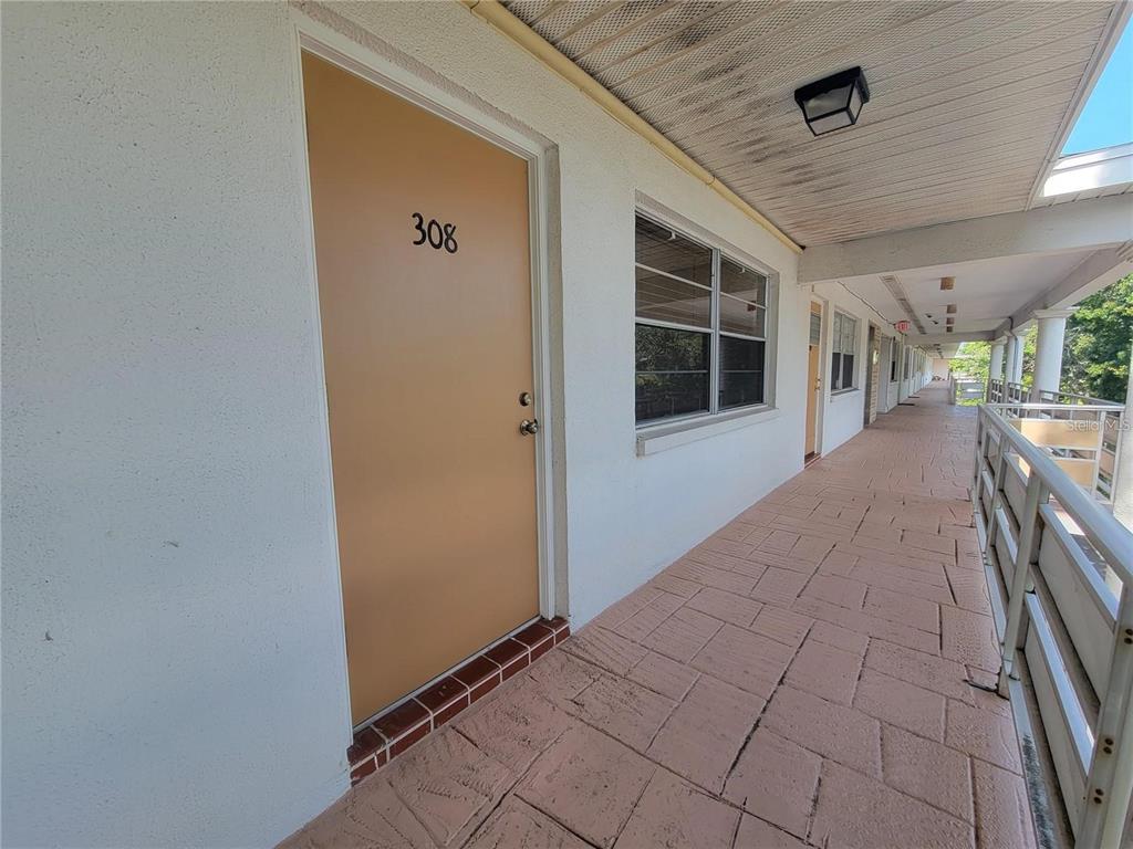 911 Washington Avenue Southwest, Unit 308 Largo, FL 33770 - Photo 1 of 24 a view of a porch