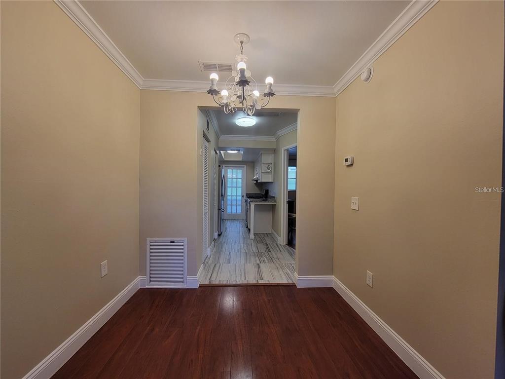 911 Washington Avenue Southwest, Unit 308 Largo, FL 33770 - Photo 12 of 24 a view of a room with wooden floor