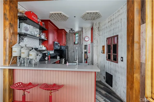 a bathroom with a toilet a sink and a mirror