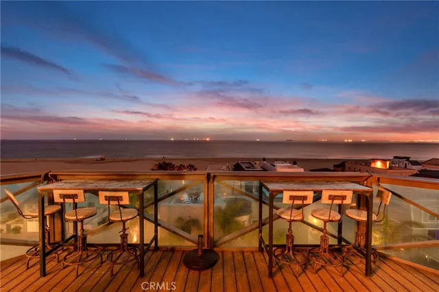 a bed room with a bed and a large window