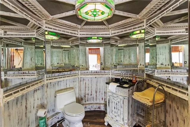 a view of a two chairs in the balcony