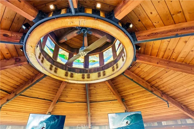 a view of a swimming pool with outdoor seating