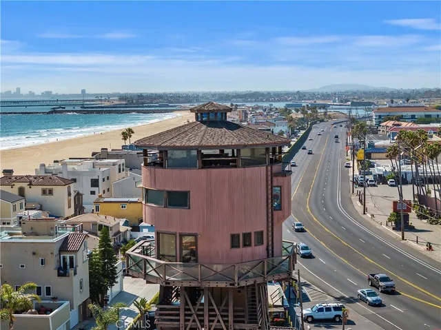 a outdoor living space with patio furniture and a fireplace