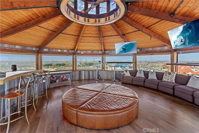 a view of dinning table and chairs in a patio