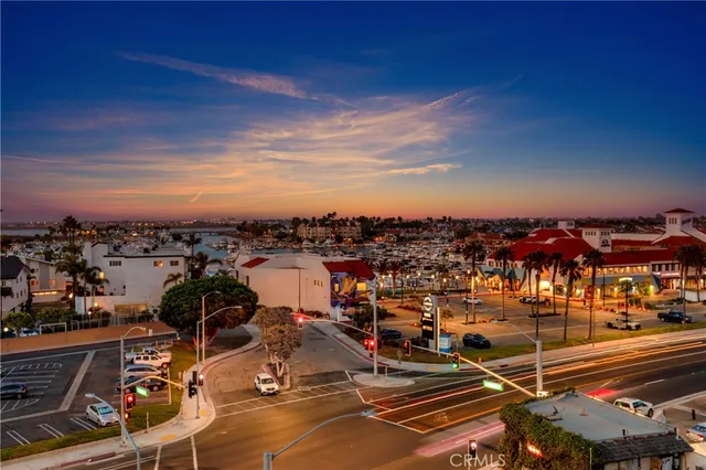 a bedroom with furniture and wooden floor