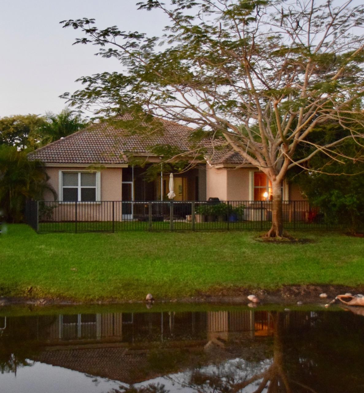 12353 Riverfalls Court Boca Raton, FL 33428 - Photo 24 of 37 12353 back lake view