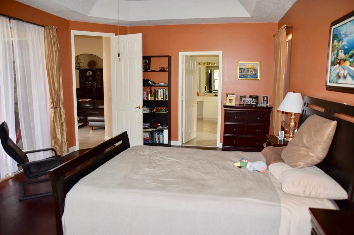 12353 Riverfalls Court Boca Raton, FL 33428 - Photo 4 of 37 master bed 3