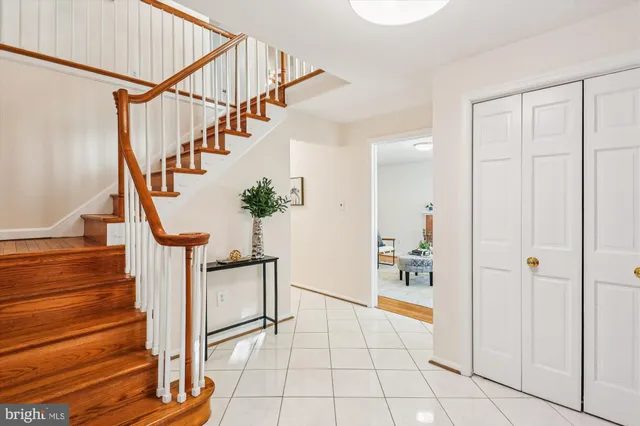 a view of an entryway with wooden floor