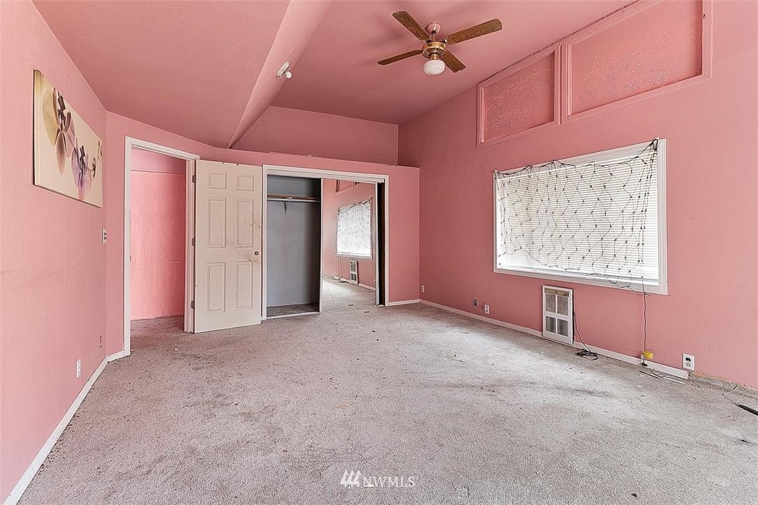 17849 Renton-Maple Valley Road Maple Valley, WA 98038 - Photo 14 of 33 an empty room with windows and fan