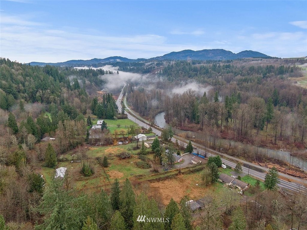 17849 Renton-Maple Valley Road Maple Valley, WA 98038 - Photo 31 of 33 a view of a town with mountains in the background