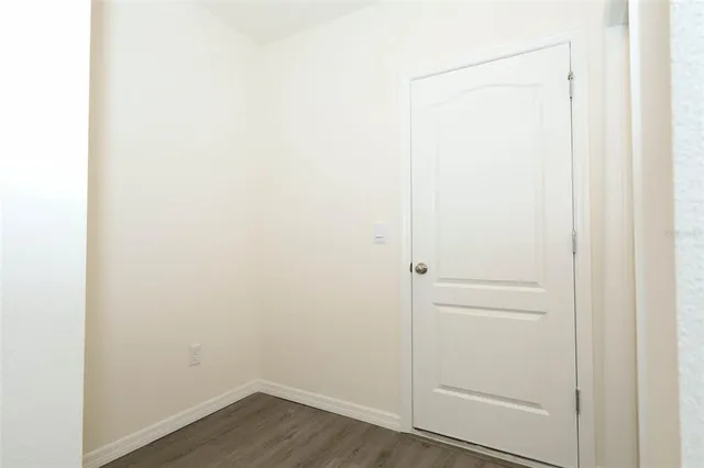 a view of small space with wooden floor