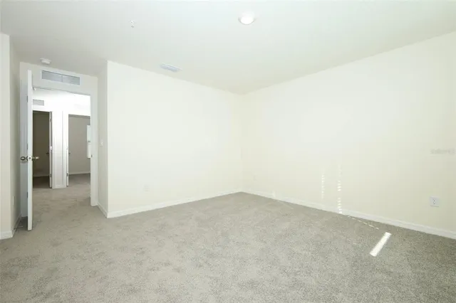 an empty room with an entryway