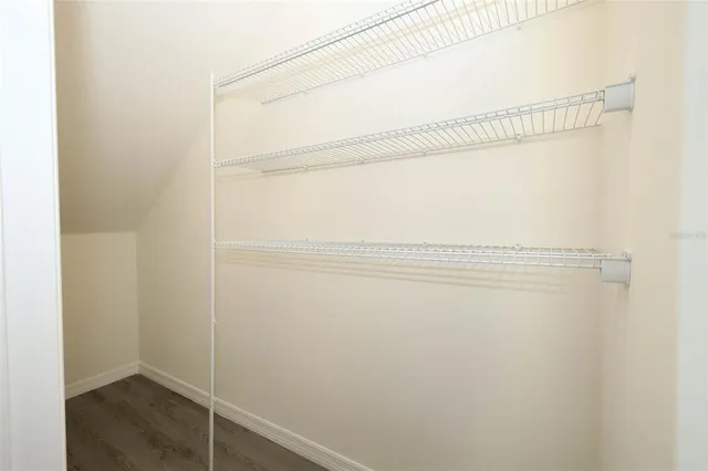a view of a room with racks on the wall