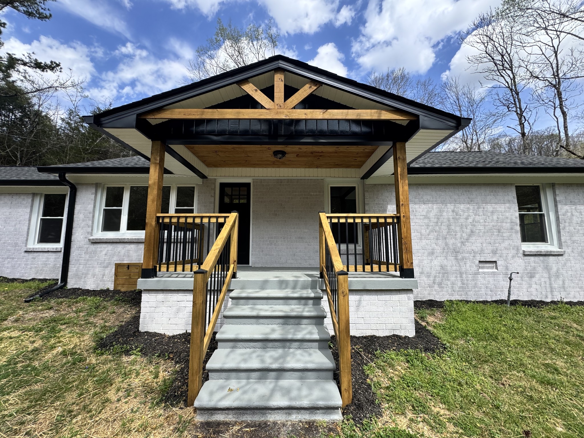 220 Friendship Hollow Road South Pleasant Shade, TN 37145 - Photo 1 of 50 a front view of a house with a yard
