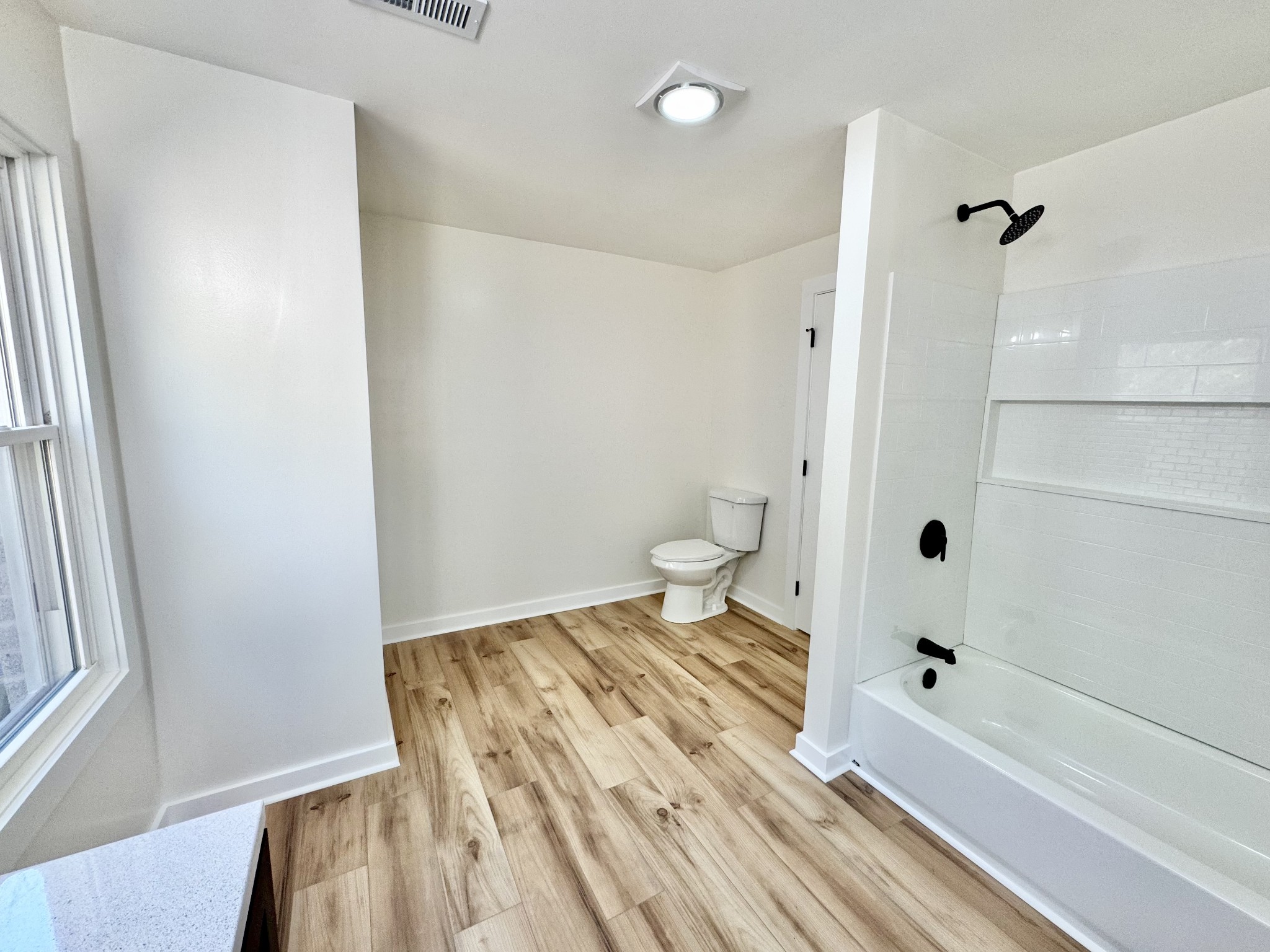 220 Friendship Hollow Road South Pleasant Shade, TN 37145 - Photo 18 of 50 a bathroom with a sink and a shower