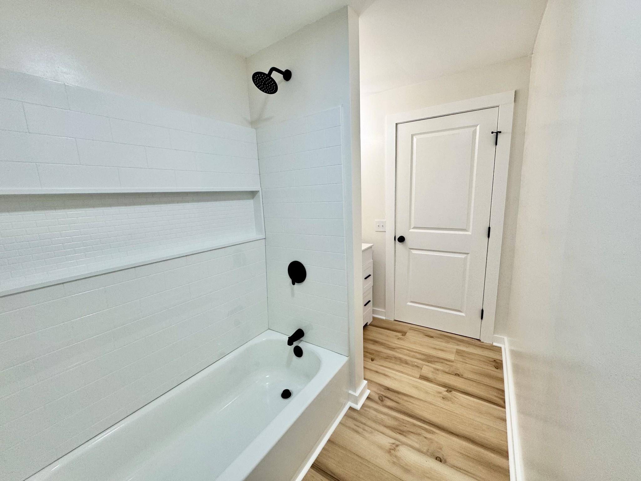 220 Friendship Hollow Road South Pleasant Shade, TN 37145 - Photo 24 of 50 a bathroom with a bathtub and shower