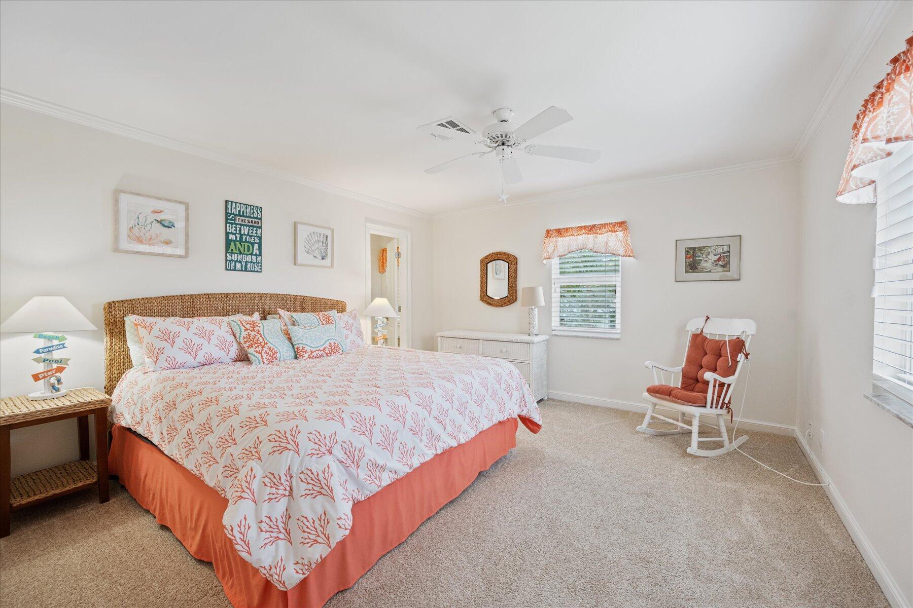 1180 Singer Drive Singer Island, FL 33404 - Photo 14 of 24 a bedroom with a bed chair and window