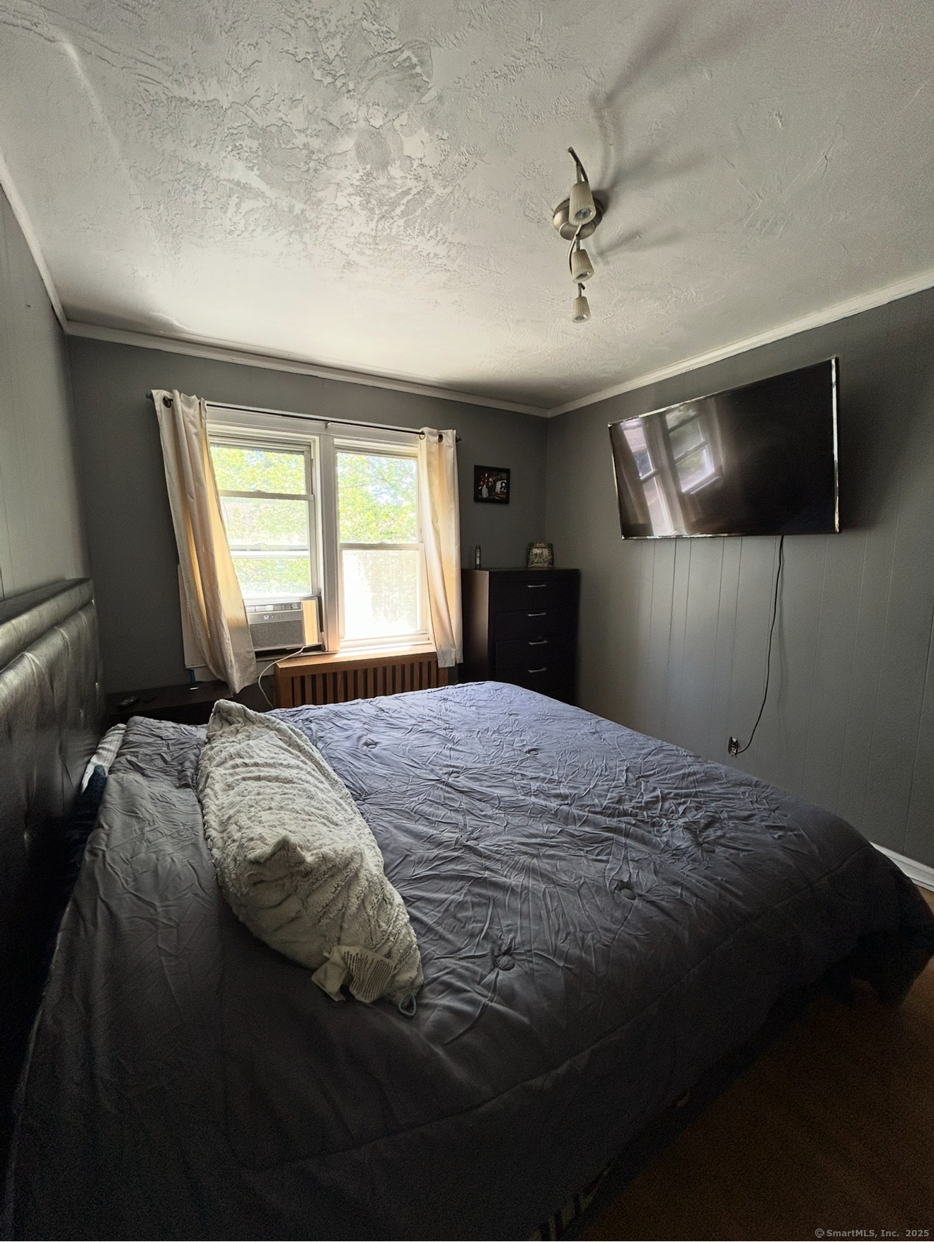 744 Canaan Road, Unit 23 Bridgeport, CT 06610 - Photo 11 of 14 a bedroom with a bed and a window