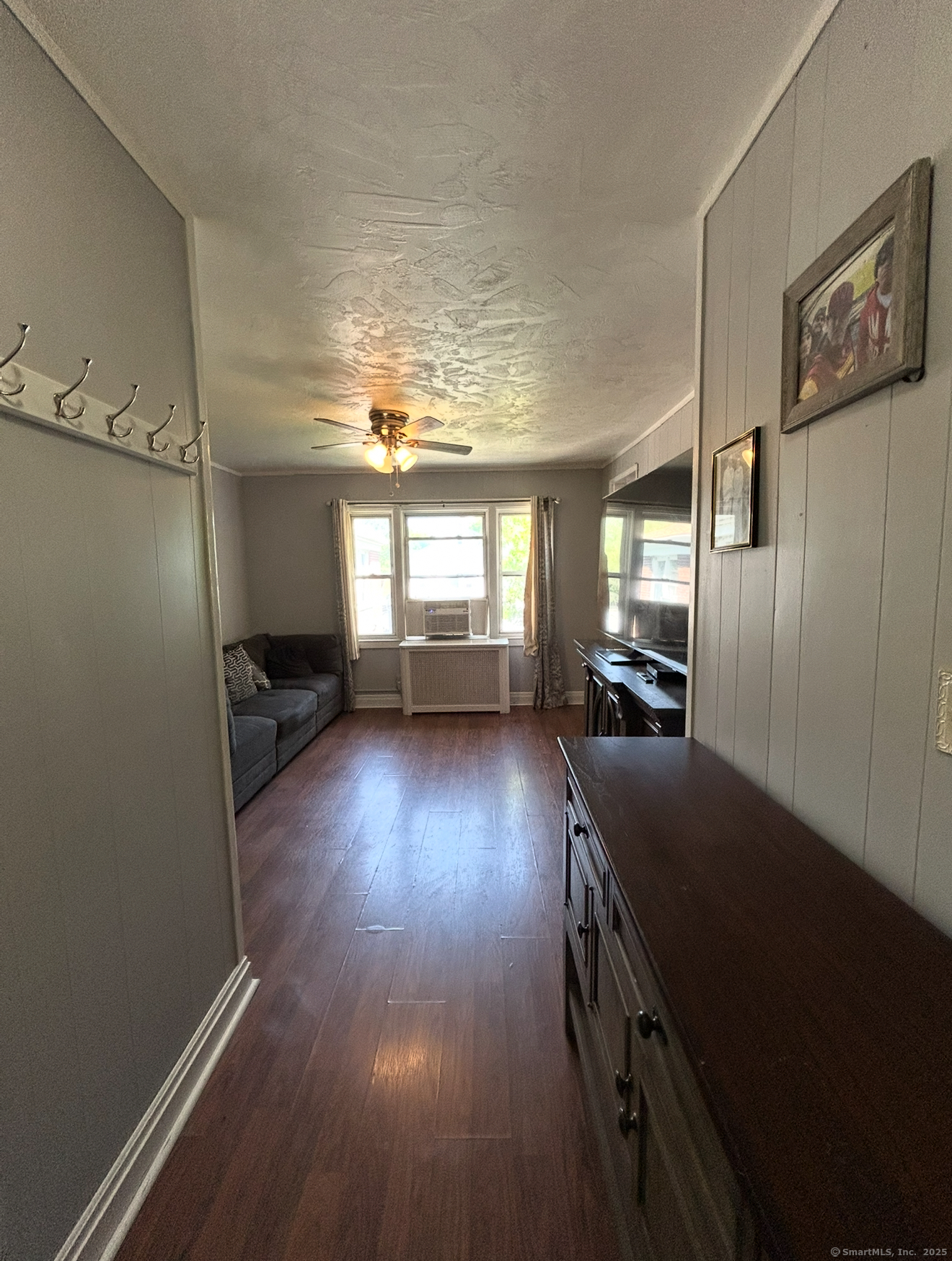 744 Canaan Road, Unit 23 Bridgeport, CT 06610 - Photo 5 of 14 a view of hallway with wooden floor
