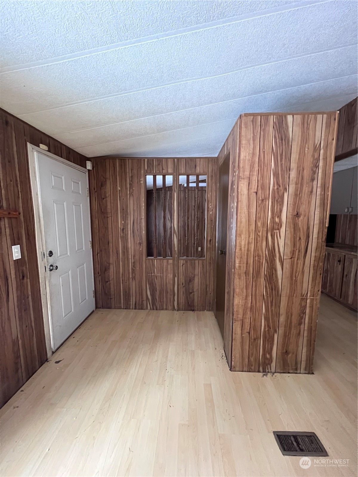 2408 Newberg Road Snohomish, WA 98290 - Photo 22 of 32 a view of a room with a wooden walls