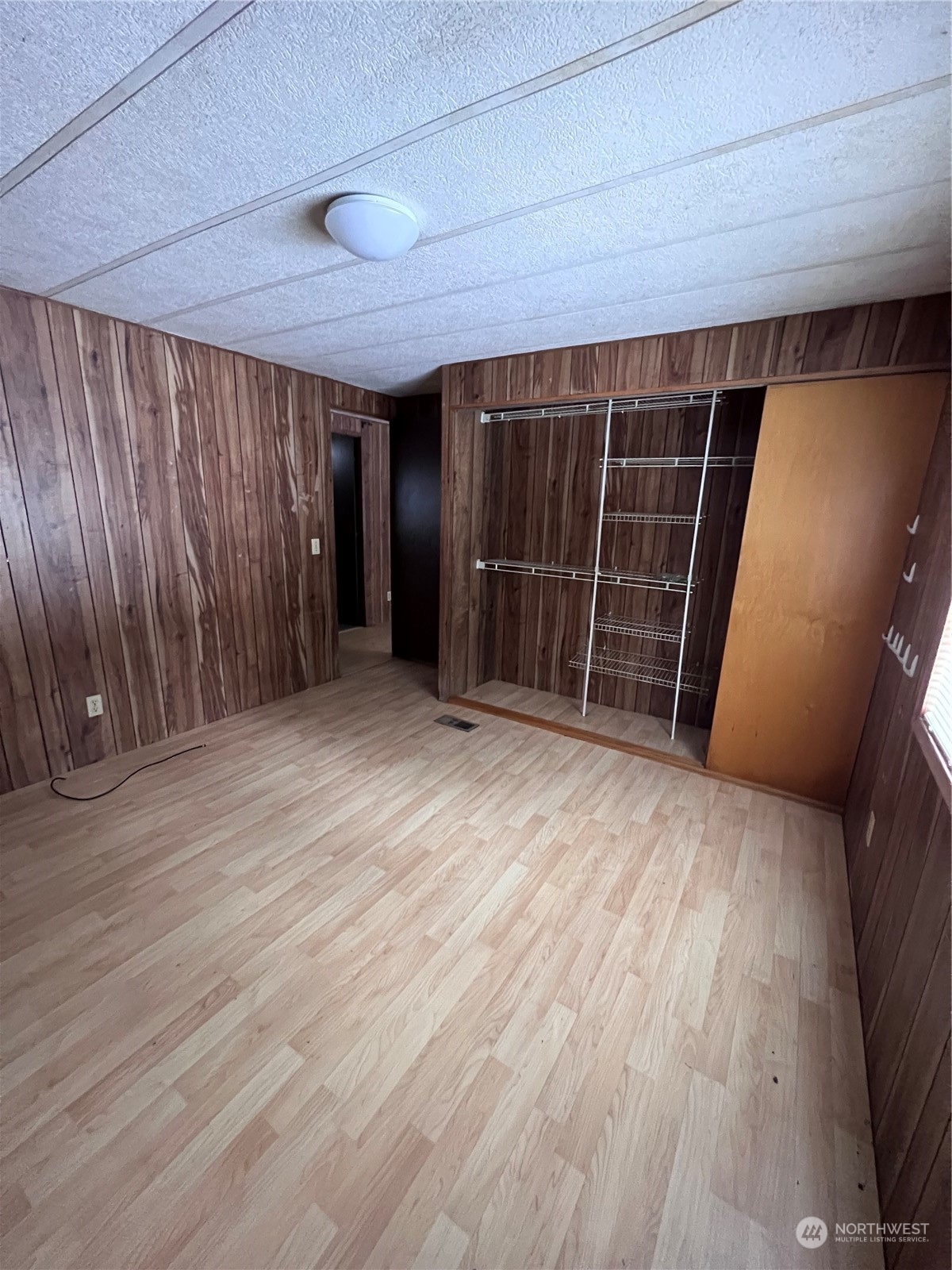 2408 Newberg Road Snohomish, WA 98290 - Photo 5 of 32 an empty room with wooden floor and entrance