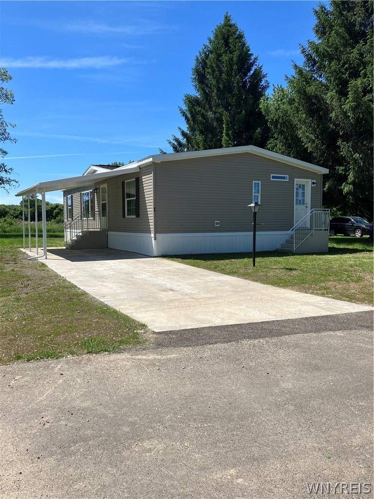 6070 Michigan Road Arcade, NY 14009 - Photo 1 of 1 Front Exterior with carport