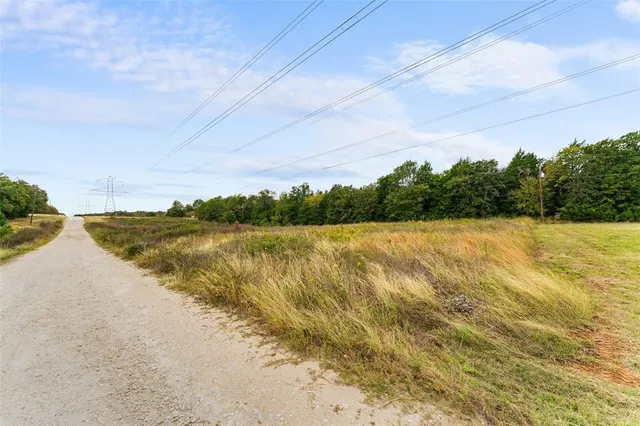 a view of lake with green space