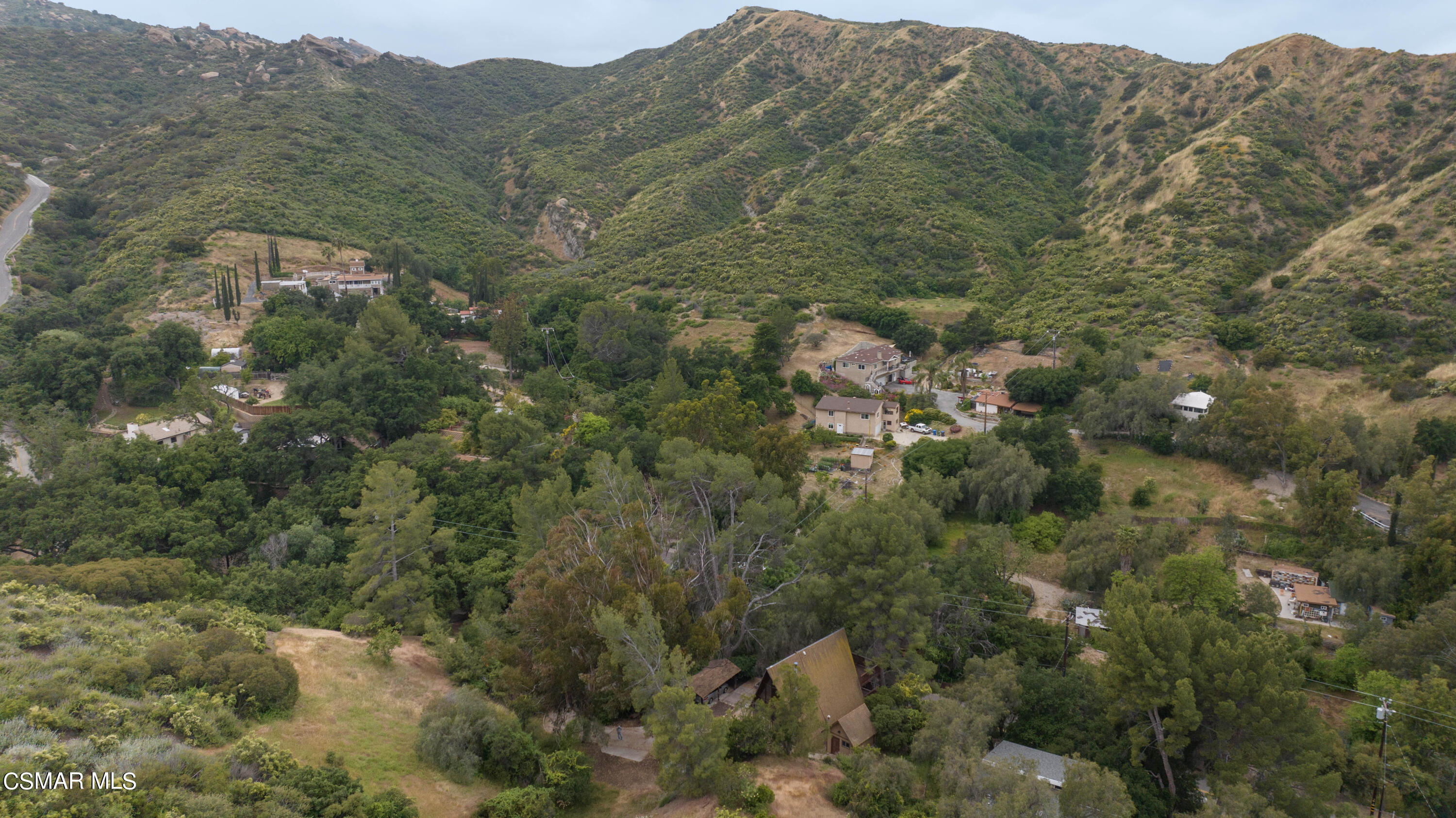 1024 Black Canyon Road Simi Valley, CA 93063 - Photo 20 of 31 an aerial view of residential houses with outdoor space and trees