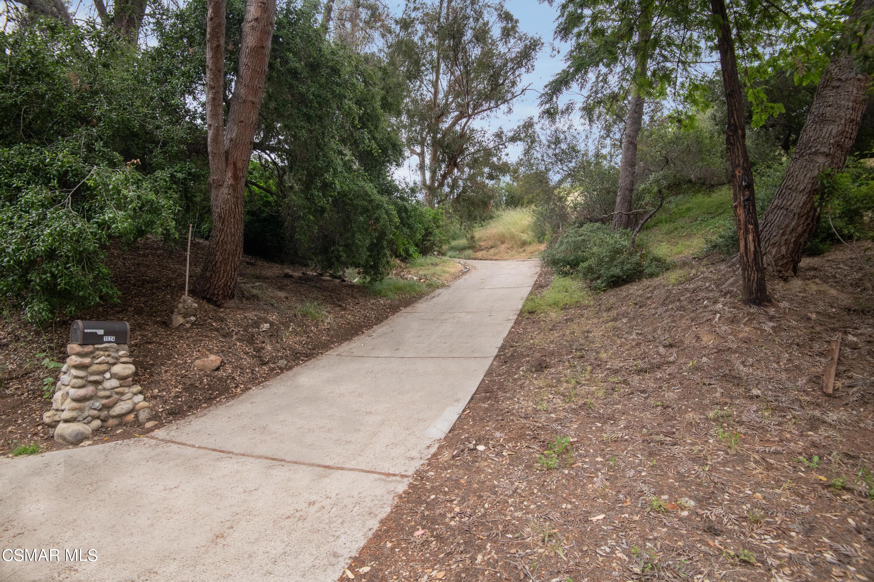 1024 Black Canyon Road Simi Valley, CA 93063 - Photo 2 of 31 a pathway of a yard