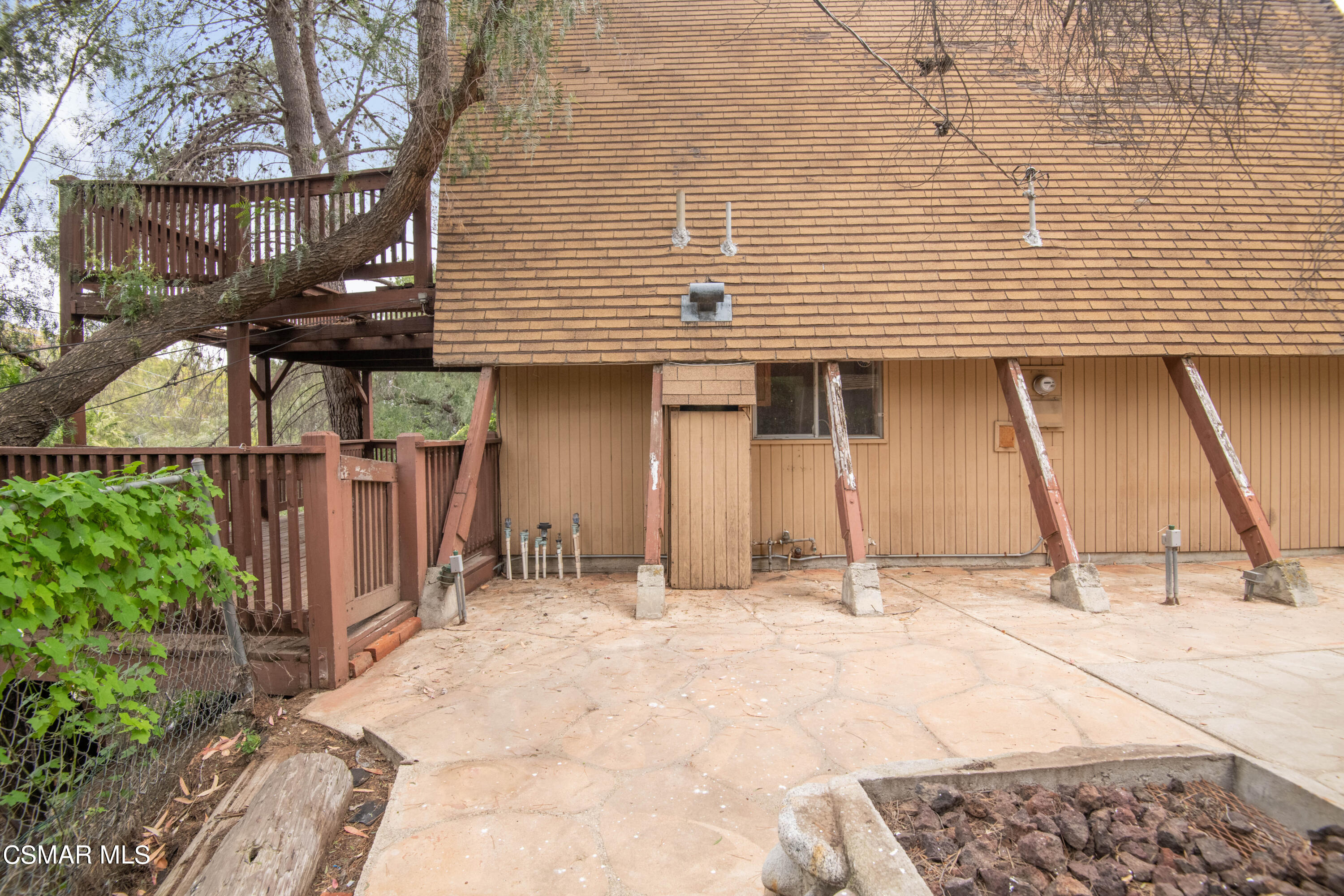 1024 Black Canyon Road Simi Valley, CA 93063 - Photo 23 of 31 a view of a house with wooden fence