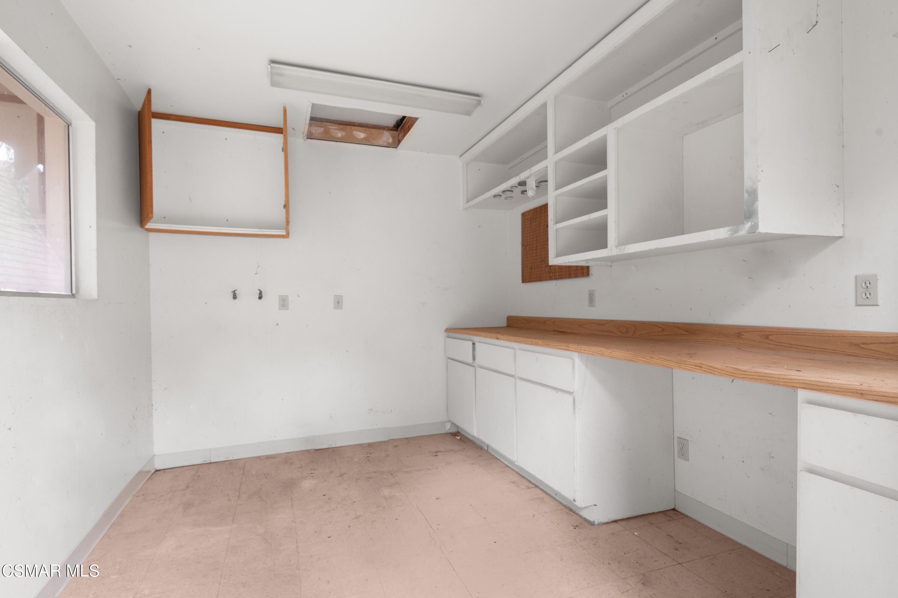 1024 Black Canyon Road Simi Valley, CA 93063 - Photo 25 of 31 a room with storage and utility