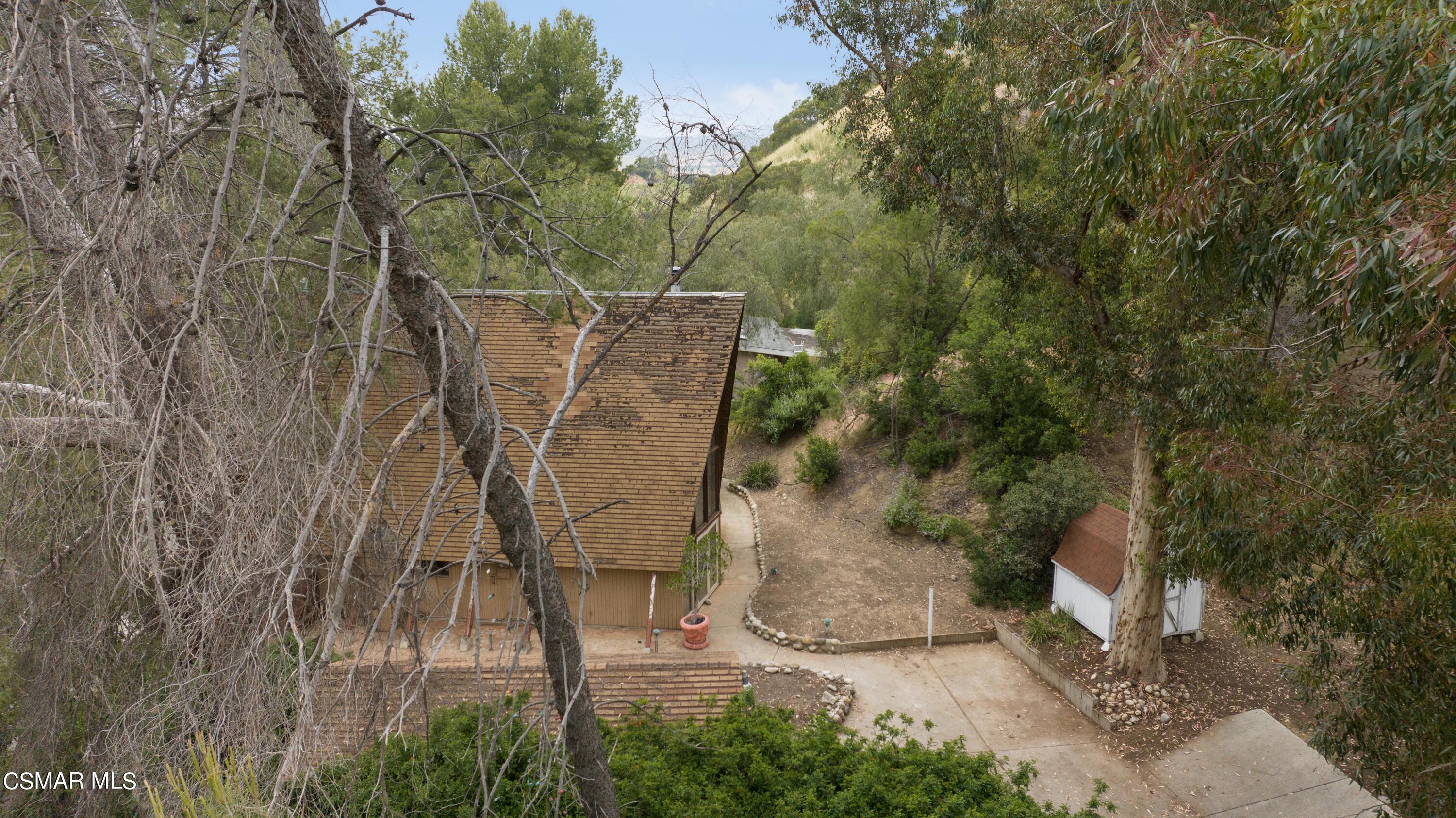 1024 Black Canyon Road Simi Valley, CA 93063 - Photo 28 of 31 a view of a yard with large trees