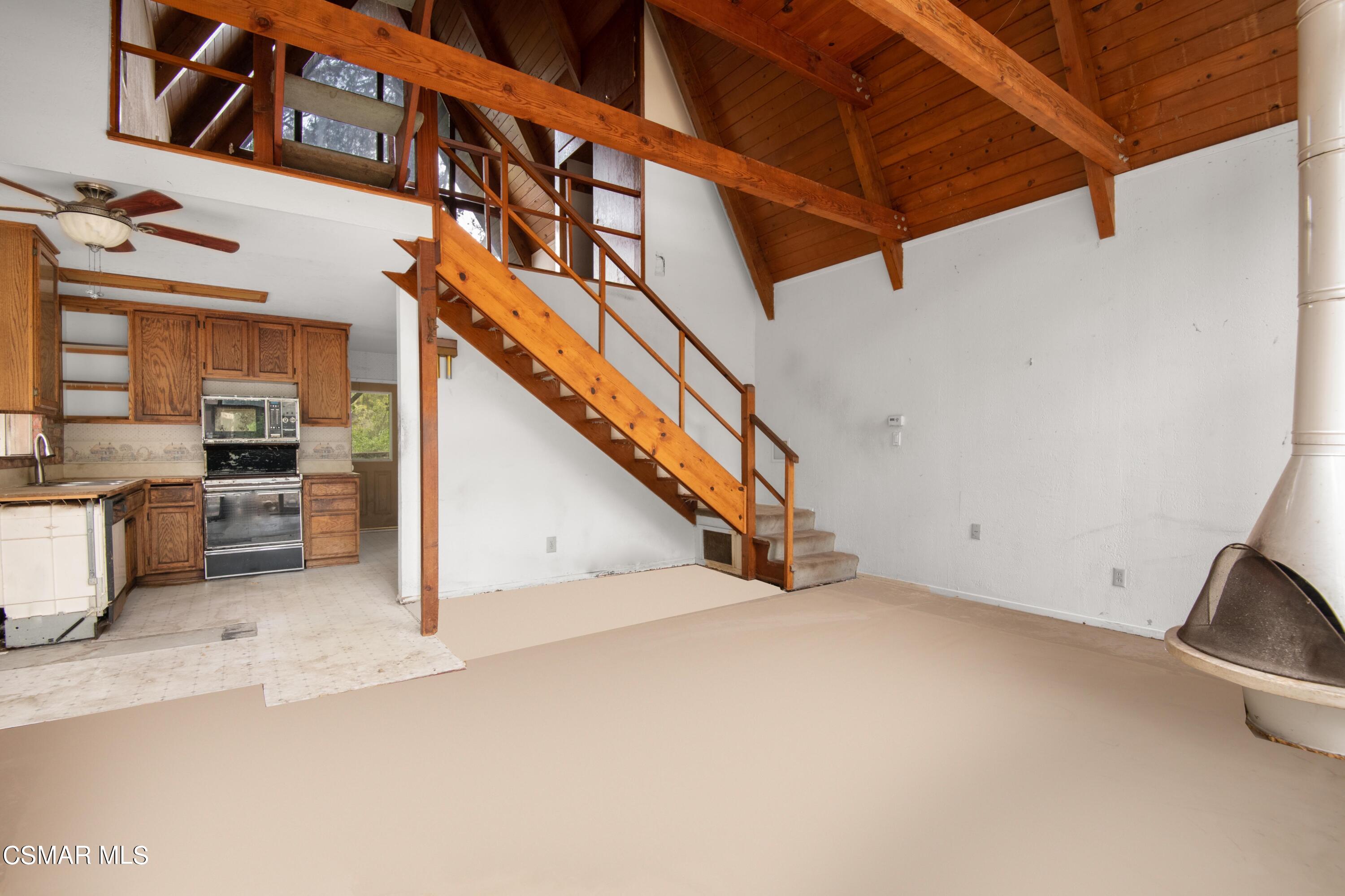 1024 Black Canyon Road Simi Valley, CA 93063 - Photo 6 of 31 a view of a hallway with stairs