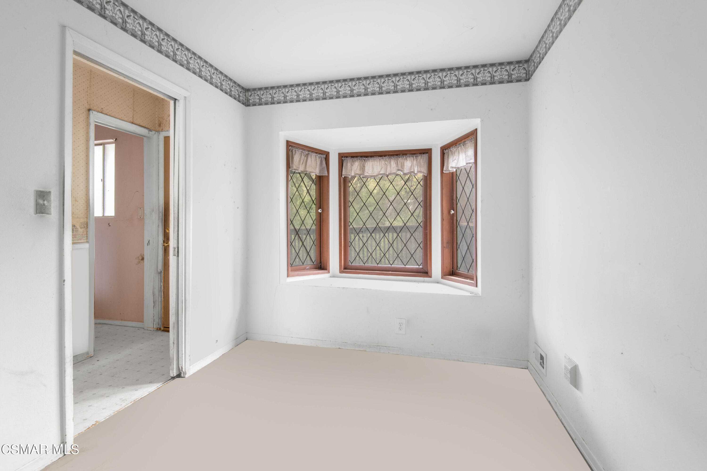 1024 Black Canyon Road Simi Valley, CA 93063 - Photo 10 of 31 a view of an empty room with a window