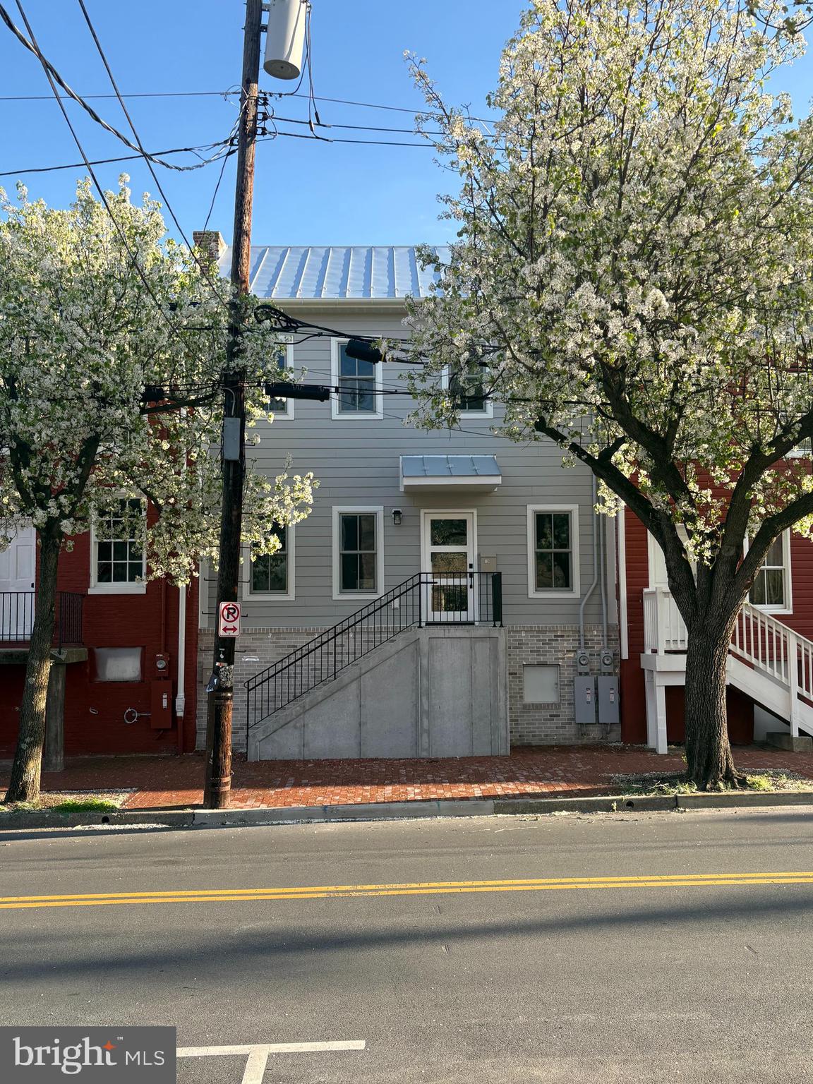 106 West All Saints Street, Unit B2 Frederick, MD 21701 - Photo 2 of 16 a view of a house with a patio