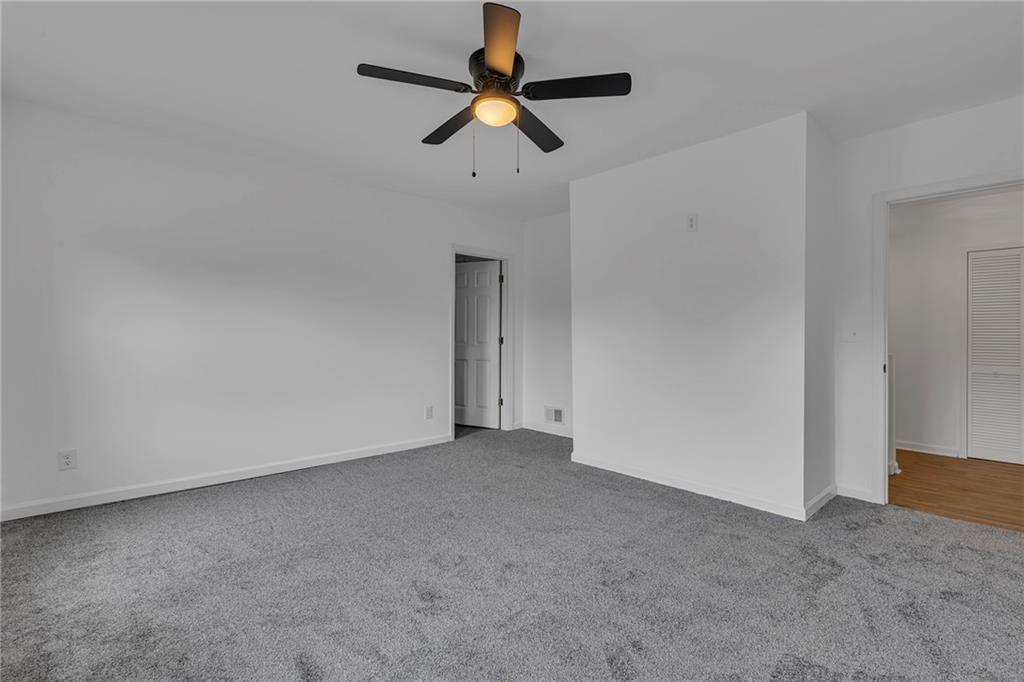 193 Virginia Avenue Rochester, PA 15074 - Photo 16 of 37 an empty room with chandelier fan