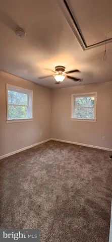 a view of a livingroom with a fireplace