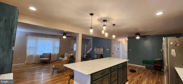 a room with furniture and wooden floor