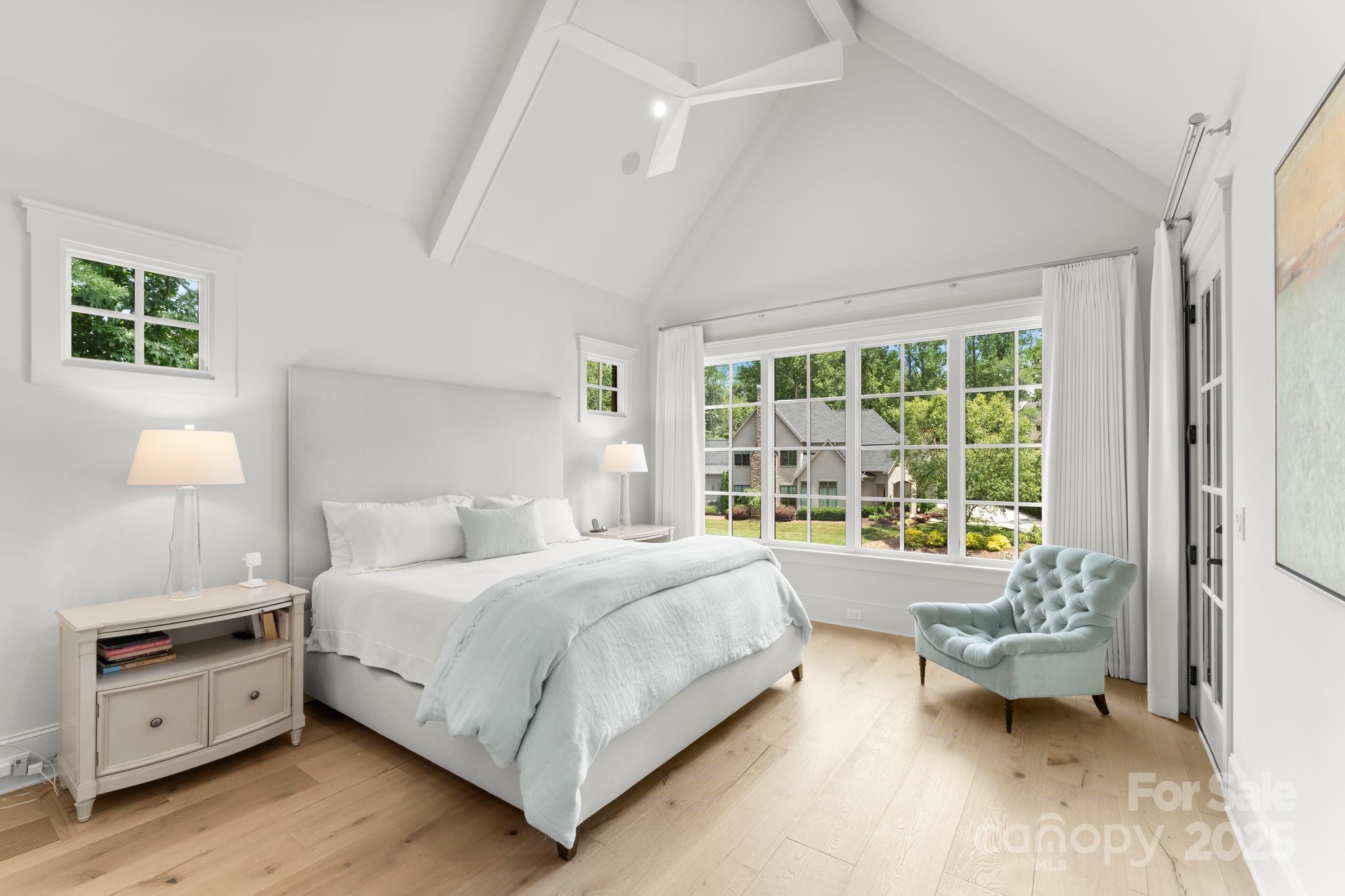 21216 Olde Quarry Lane Cornelius, NC 28031 - Photo 18 of 48 a bedroom with a bed and a night stand