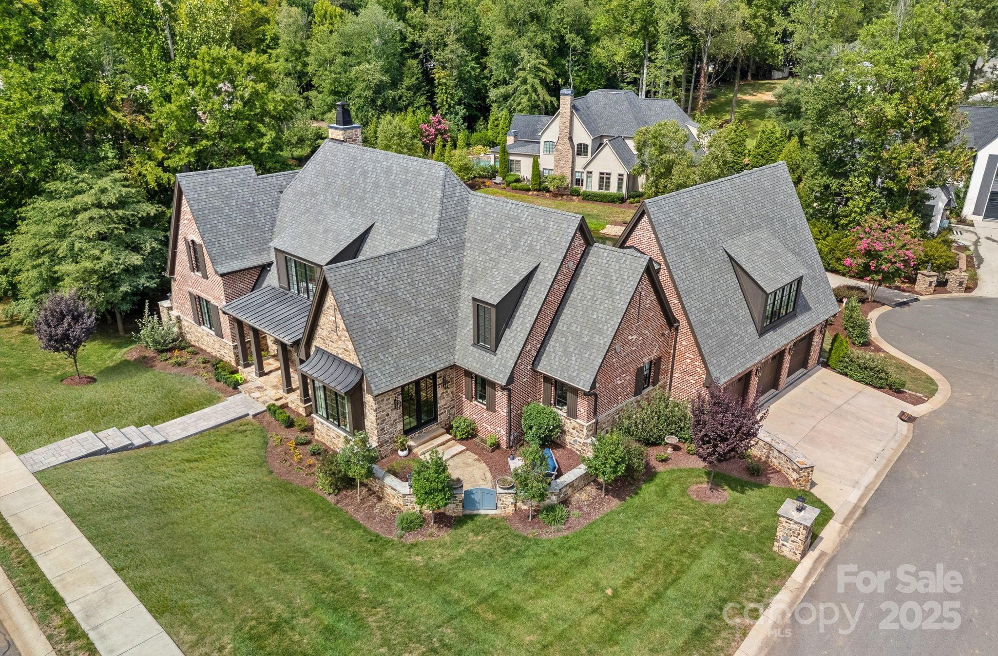 21216 Olde Quarry Lane Cornelius, NC 28031 - Photo 2 of 48 an aerial view of a house with big yard