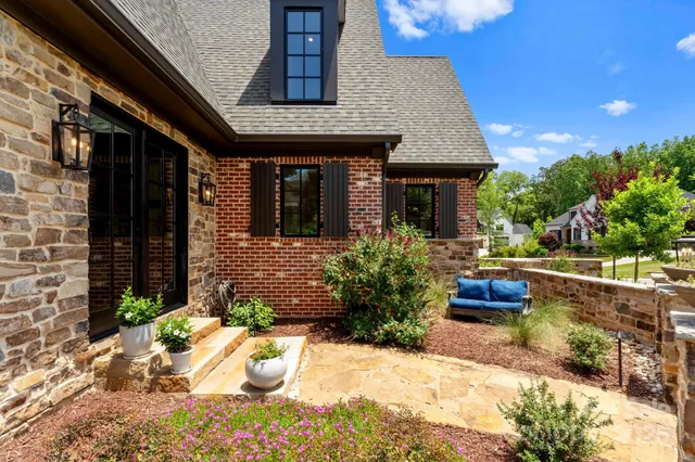 a front view of a house with patio