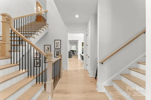 a view of a hallway view with staircase