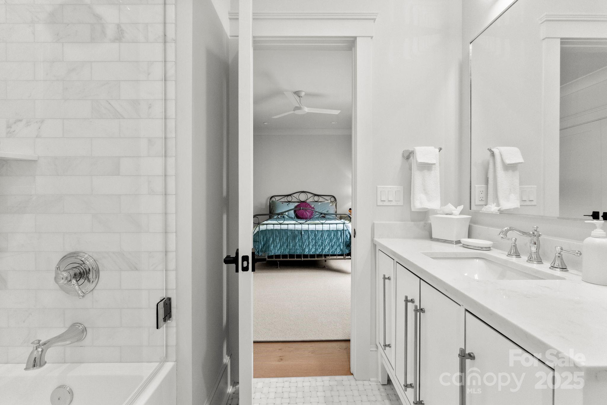 21216 Olde Quarry Lane Cornelius, NC 28031 - Photo 38 of 48 a bathroom with a sink and a mirror
